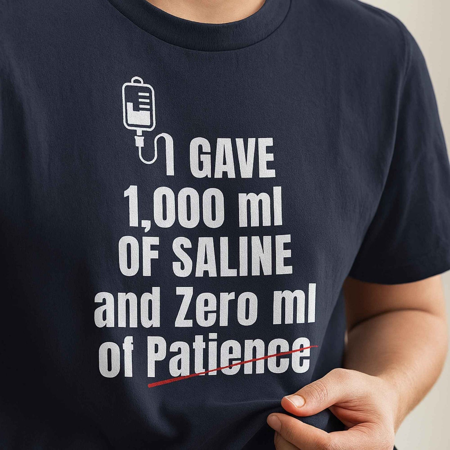 Funny ER nurse gift — cotton nurse t-shirt reading "1,000ml of saline. 0ml of patience"
