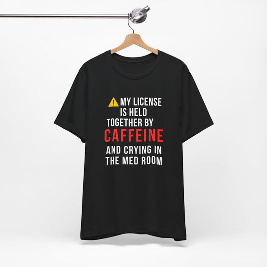 Funny OR nurse gift — cotton nurse t-shirt reading "Caffeine and crying. The full ER nurse c"