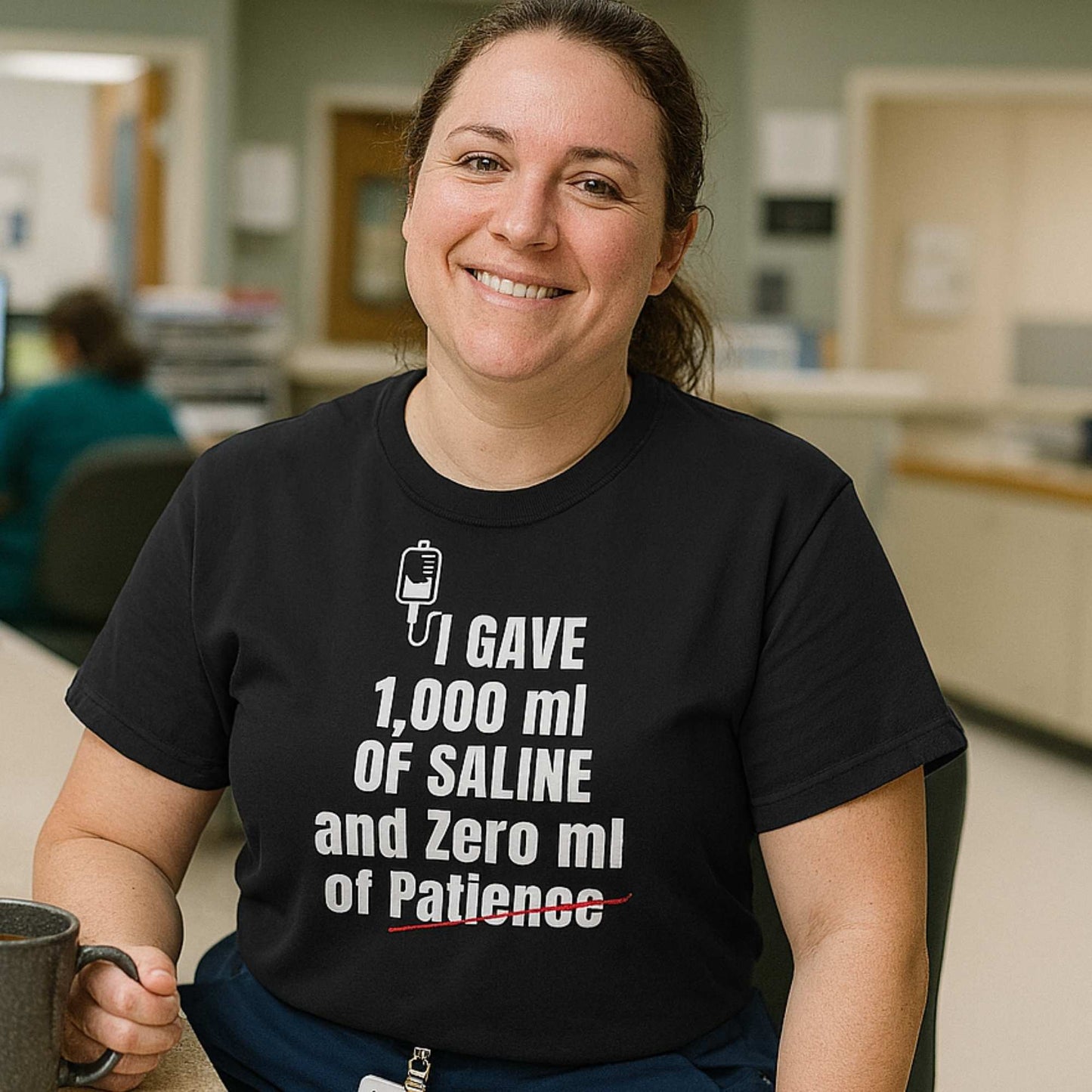Funny ER nurse gift — cotton nurse t-shirt reading "1,000ml of saline. 0ml of patience"