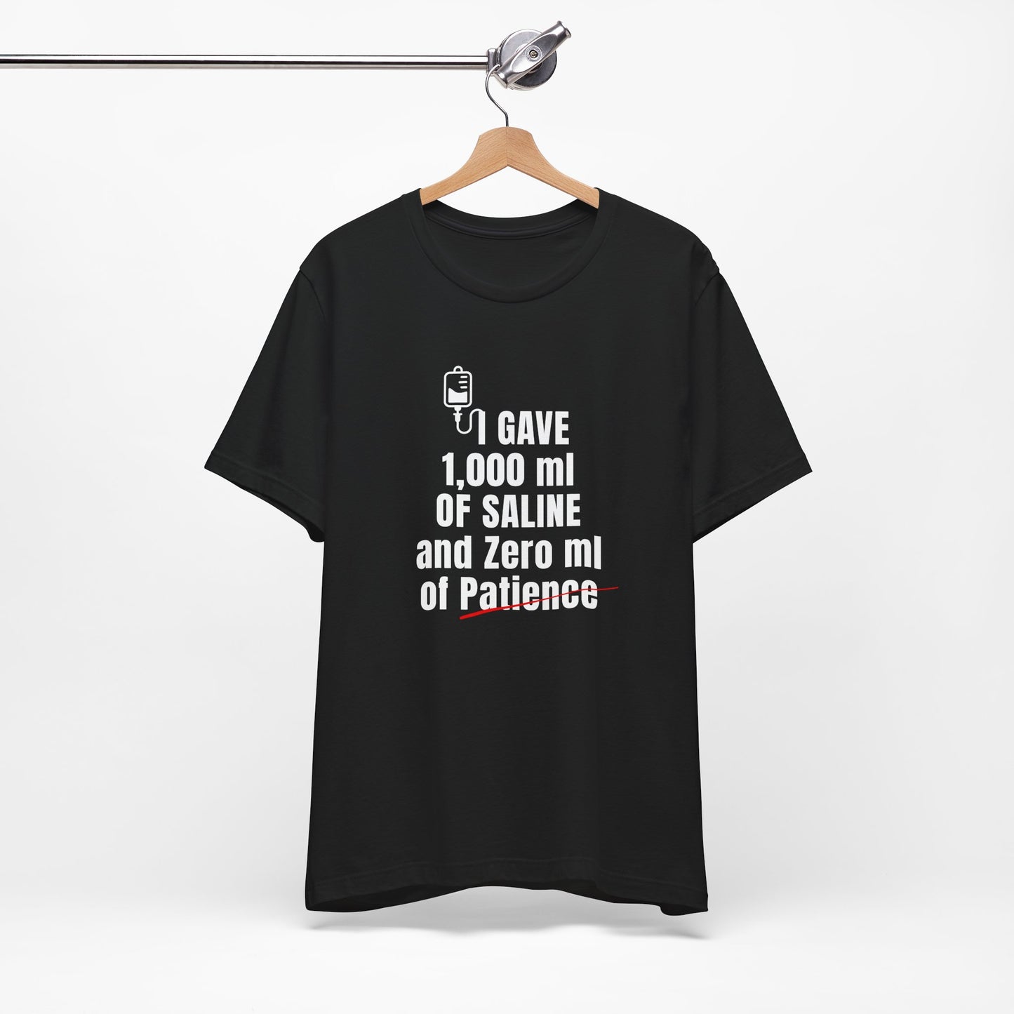 Funny ER nurse gift — cotton nurse t-shirt reading "1,000ml of saline. 0ml of patience"
