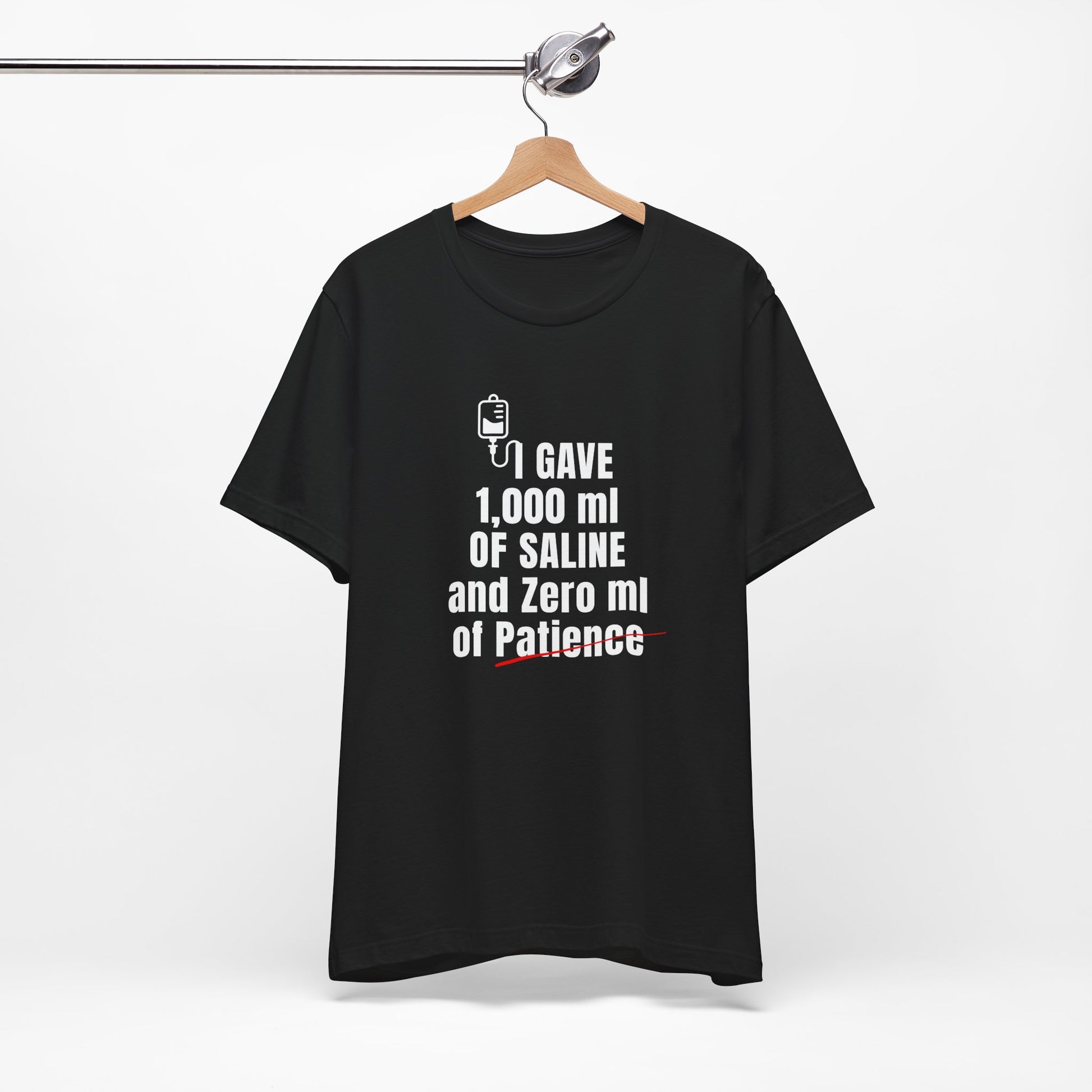 Funny ER nurse gift — cotton nurse t-shirt reading "1,000ml of saline. 0ml of patience"