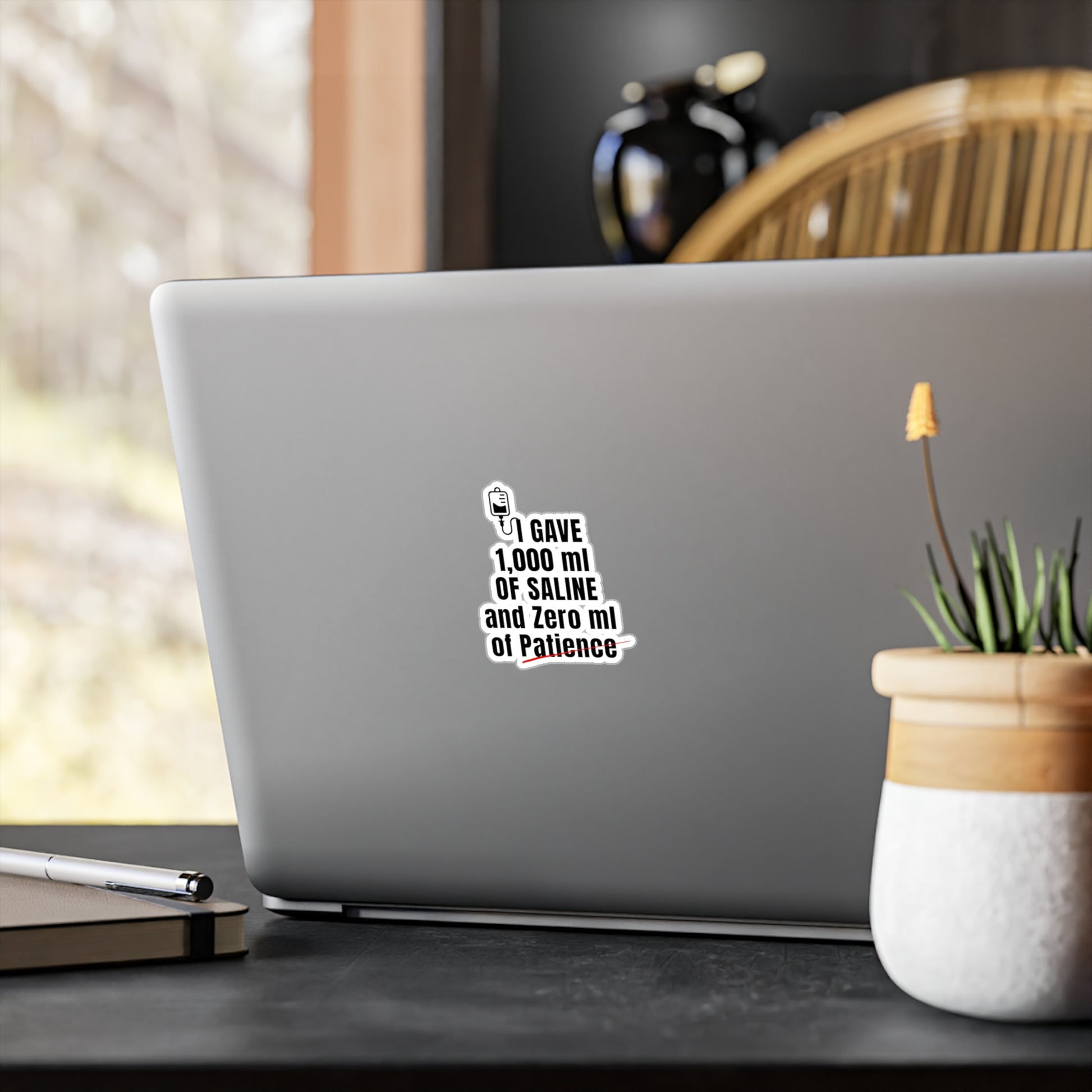 Funny ER nurse gift — 3-inch vinyl nurse sticker reading "1,000ml of saline. 0ml of patience"