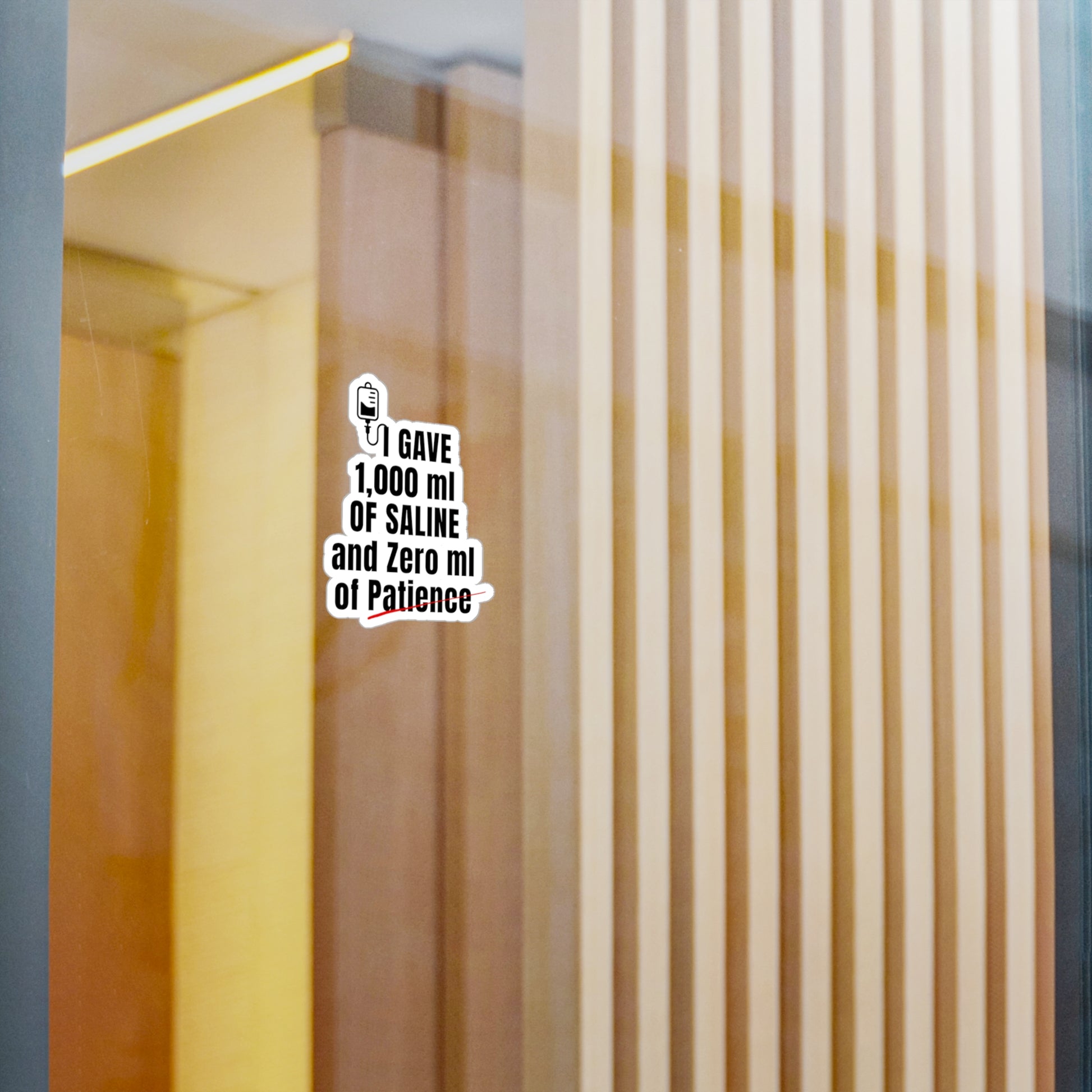 Funny ER nurse gift — 3-inch vinyl nurse sticker reading "1,000ml of saline. 0ml of patience"