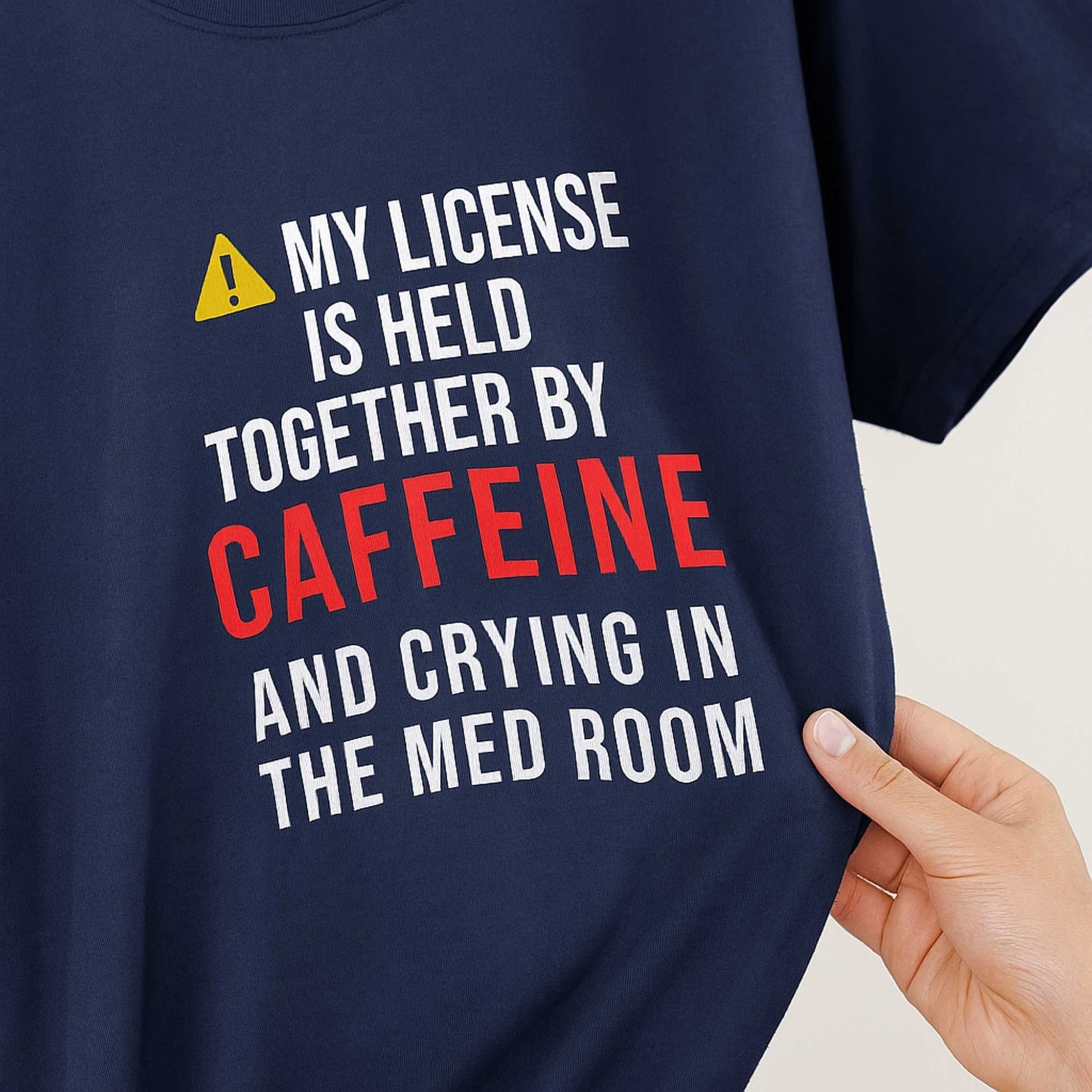 Funny OR nurse gift — cotton nurse t-shirt reading "Caffeine and crying. The full ER nurse c"