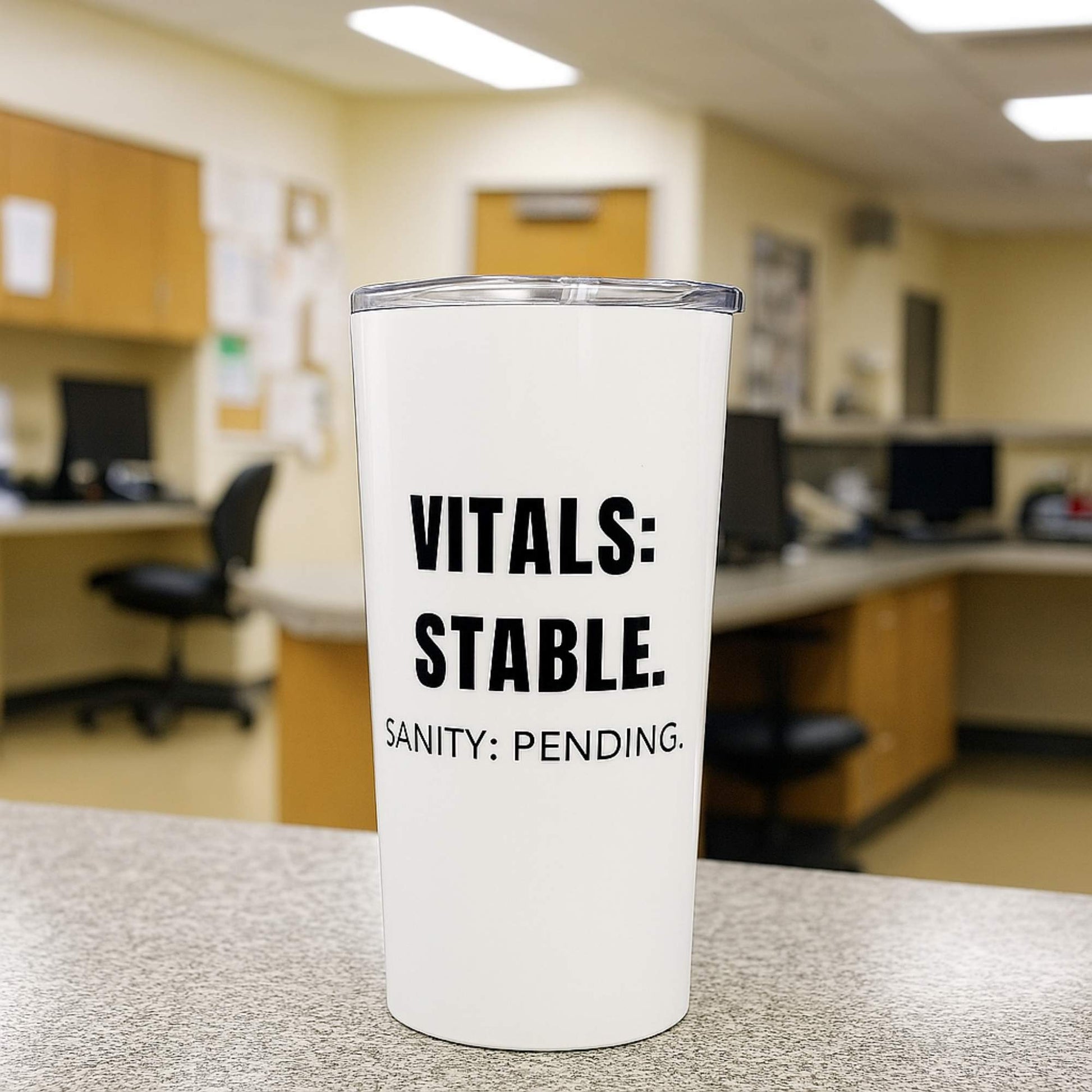 Funny ER nurse gift — 20oz stainless steel nurse tumbler reading "Vitals stable. Sanity: pending. White on"